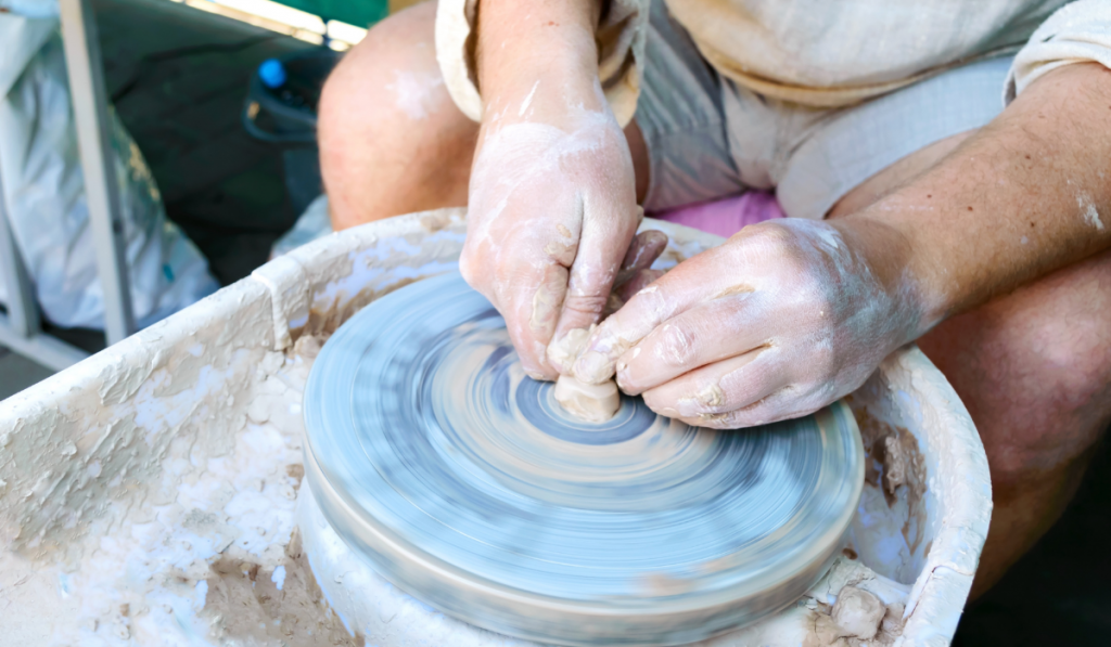 Making pottery on a potter's wheel.ee220326