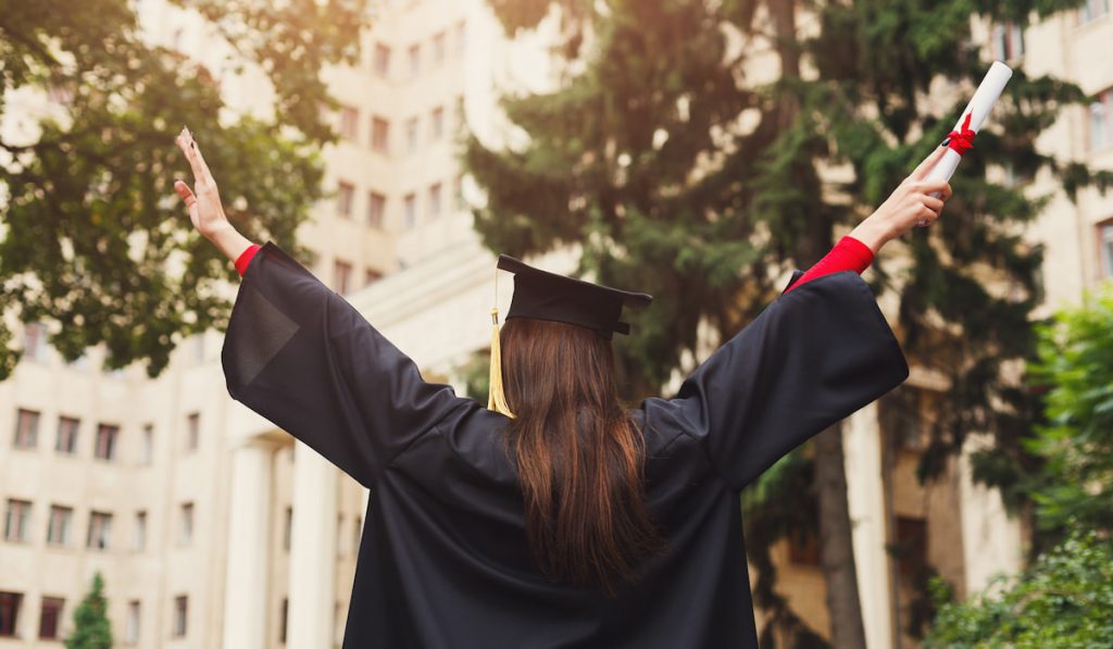 Happy woman on her graduation day at university