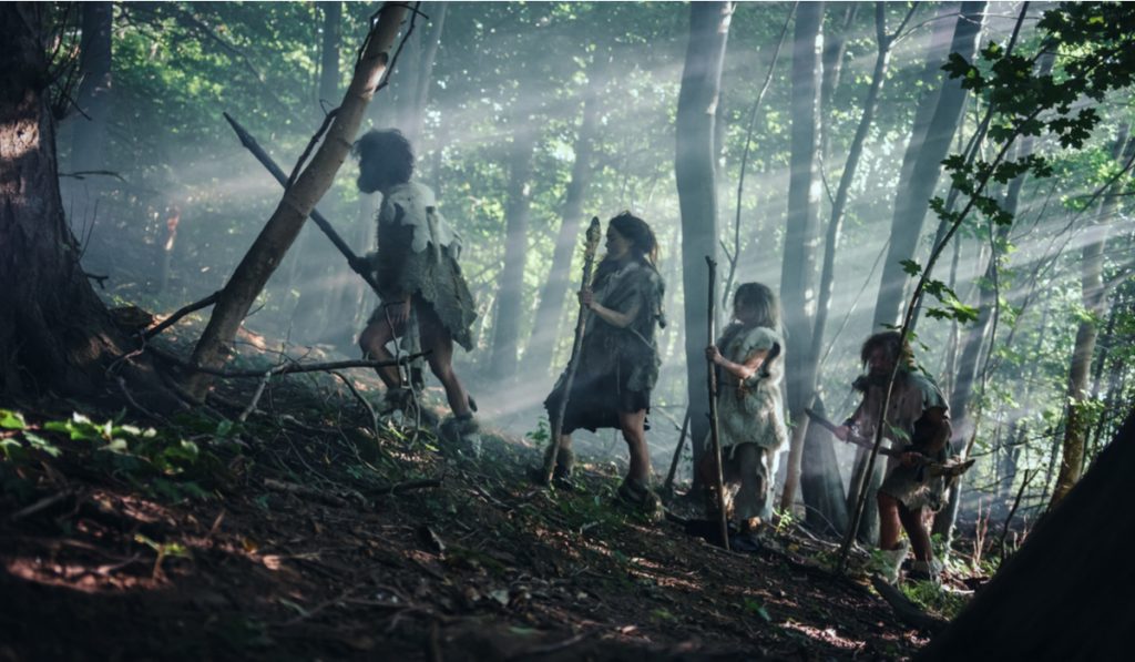 four tribe wearing neanderthals clothing and shoes while hunting 