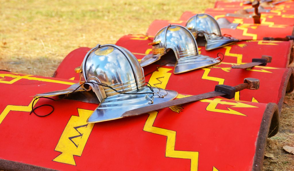 red roman shield and their crest sword 