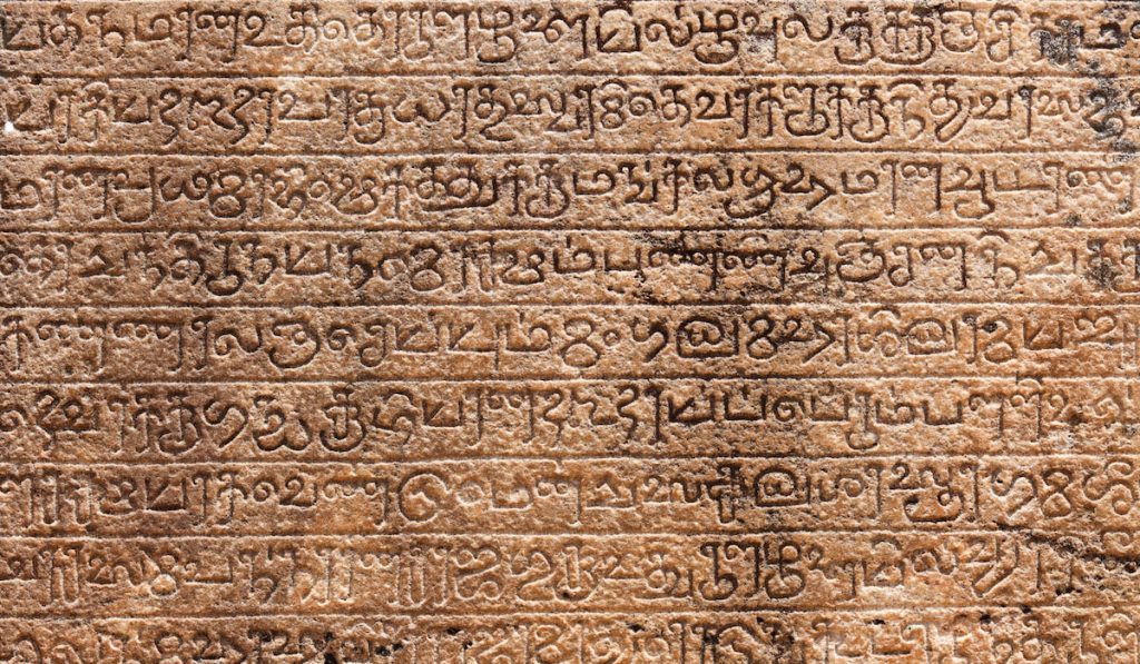 Ancient stone language inscriptions texture