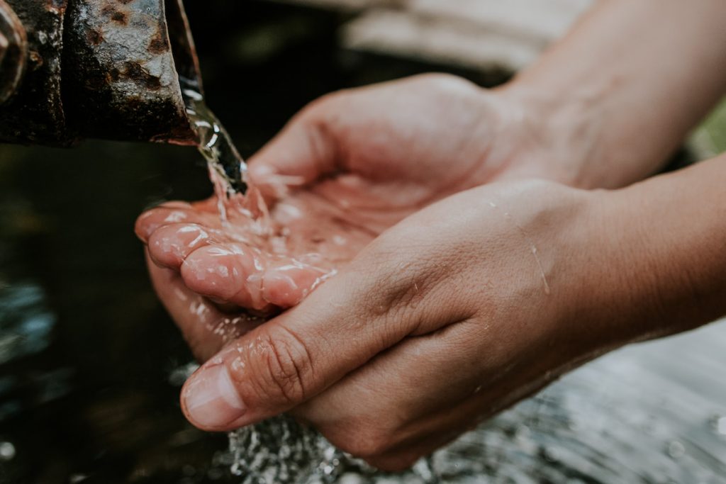 Washing hands in fresh water
