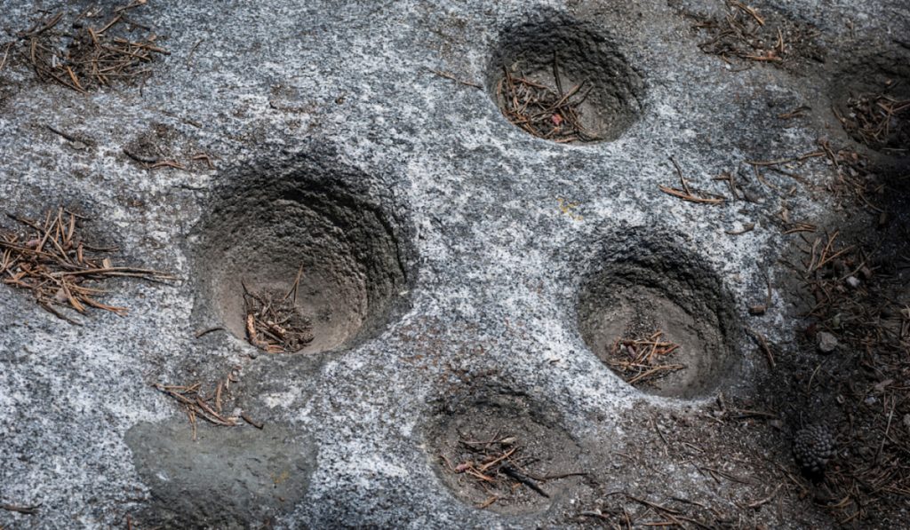 bedrock mortars closeup 